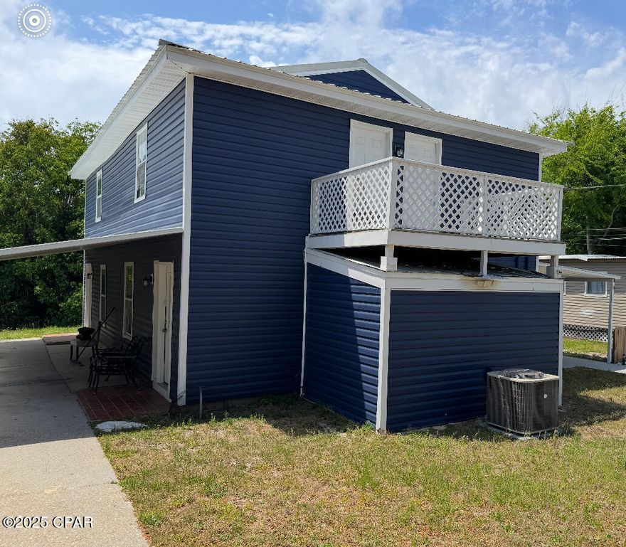 SELLER SAYS BRING ALL OFFERS!!!  This maintenance free vinyl sided duplex has a spacious living room, dining room, kitchen, 2 large bedrooms, 1 full bath and a half bath on each side.  The refrigerator and stove remain. There is plenty of interior and exterior storage plus 4 parking spaces and a large tranquil lot. This duplex offers a great investment opportunity. You could live in one side and rent the other, rent both, or your family member could live right next door! And, you can save money with ZERO association fees. If you are looking for a large 4 bedroom beach home, you could easily convert this duplex to a single family home. Plus, this duplex is conveniently located within an easy walk to the beach and there is a peek-a-boo view of both the Gulf and Sugar Sand Lake from the two balconies.