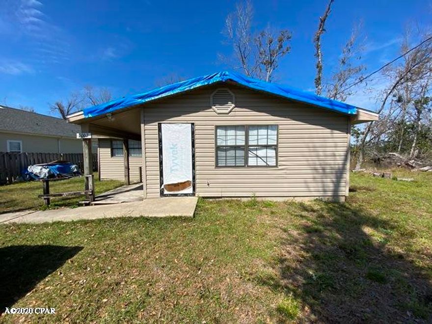 This is a sturdy block home in a quiet setting, nestled up close to the Bayou. The home is a project in process with really good bones. There is an outbuilding that was severely damaged by hurricane Michael. The main home has a newer air conditioning system and state of the art water heater. The home was in the process of renovation and is being offered strictly AS-IS. There are three bedrooms plus a bonus room. One of the two bathrooms is presently gutted and will need to be a built out. There is little traffic on this dead end road and there's a 

boat drop close by. This home is a value to the buyer that has cash to purchase and contractor skills to complete.