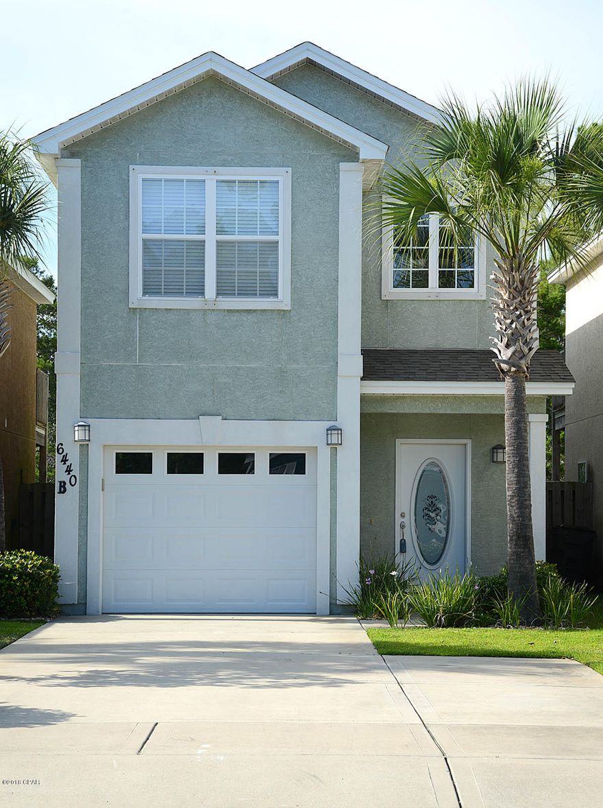 Don't miss your chance to own this VERY CUTE three bedroom two and half bath home in Panama City Beach!!! Located on the east end of Panama City Beach off Thomas Drive, this wondeful home is situated for easy access to shopping, dining, St. Andrews State Park, the Navy Base and is within walking distance to Patronis Elementary School. Home features an open floor plan, tile floors down stairs, spacious kitchen and lots of living space. The master bedroom has it's own balcony and bathroom suite. New carpet and paint through out the home in 2017, plus the water heater was replaced two years ago. You also have an attached single car garage and a privacy fenced backyard to relax or entertain friends in and the best part...your yard maintenance and irrigation are included in the your monthly Home Owners Association fee. So don't wait, call to schedule a showing today! All dimenstions are approximate and should be verified if important.