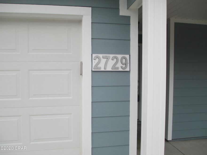 NEW CONSTRUCTION, located in Central part of town. A must see !!!.. Come take a look at this Spacious 3 Bed 2 bath Home, sitting on a CORNER Lot. The Foyer leads you into the Large Living Room with a 9' Step up Ceiling along with the view of the Open Dining Room, & Kitchen Area.. Roomy Kitchen with plenty of Cabinets, with White Granite Countertops along With an Island Bar.  Stainless Steel Appliances. ALL Electric. Exterior is of Hardi Board  Siding, with a  Metal Roof. This home has a Covered Front &  Back Porch along with a Large Driveway. Fully Sodded Yard.......Supra on Front Door.....