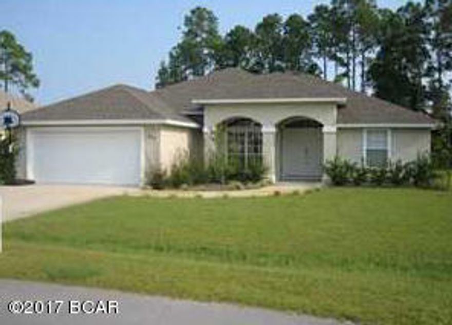 AVAILABLE MARCH 1st.  Large contemporary 3 bedroom/2 bath house in the highly sought-after Hidden Pines subdivision on the east end of Panama City Beach. Location is everything, and this home is at the end of a quiet cul-de-sac that is close to the Navy base and Coast Guard station and just minutes to shopping, restaurants, and the beautiful sugary sand beaches! This home has a great split-bedroom floor plan, 2 car garage, master suite with separate shower and garden tub and a walk-in closet. Kitchen has room for a kitchen table and chairs as well as a breakfast bar that opens to the spacious living room. The dining room and laundry room with utility sink complete this home. This is a non-smoking property. Dogs are allowed with pet fee; breed restrictions may apply. Lawn care included.