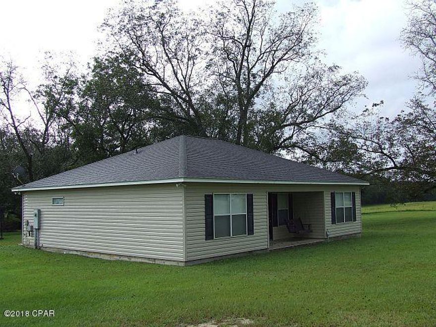 NEAT & SPACIOUS HOME IN THE COUNTRY! This 3 bedroom 2 bath home is located in a beautiful setting among the pecan trees on 1.52 acres in a rural setting.  Newly painted interior and a newly renovated master bathroom with a deep soaker tub AND a separate shower.  Stainless Steel appliances featured in the cook-friendly kitchen.  A spacious living room for game day and watching movies!  Only minutes to Graceville, Dothan, or Bonifay.  Make an appointment ASAP to see this one!!!