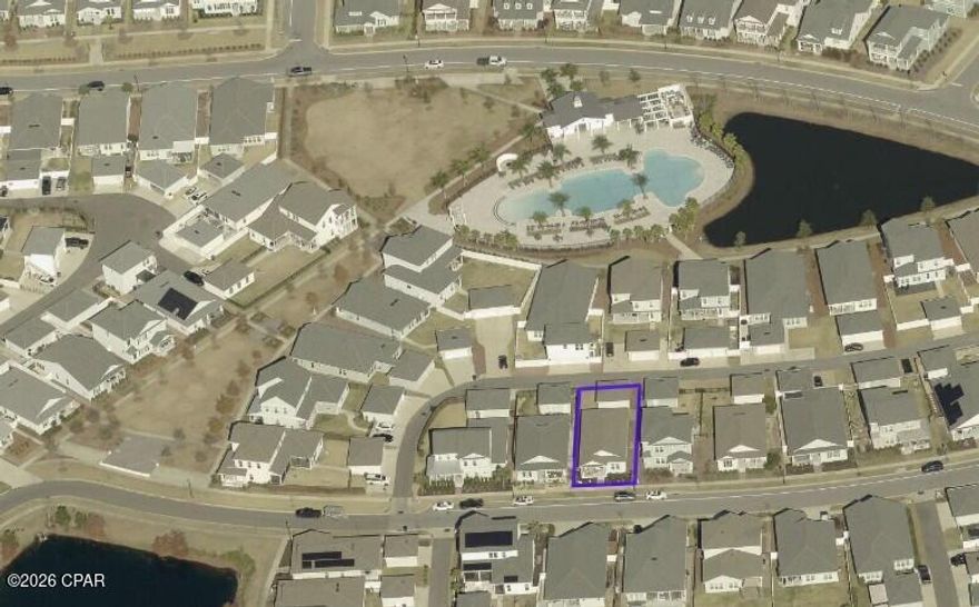 Perdido Floor Plan with covered front entry porch, a screened patio in back and a detached 2 car garage on the alley. Lower traffic street and short walk to park and community pool. A 3 bedroom [split plan] 2 bathroom with raised ceilings. Many upgrades. Quartz countertops, soft close cabinets, stainless appliances [washer and dryer included], extra recessed lights in kitchen, laundry sink, tankless hot water heater, tile floors, and dimensional shingles. Sprinkler system and landscaped yard. Room to add parking space next to garage for that extra car or watercraft. Includes a washer and dryer. Neighborhood features University Academy Charter School, resort style swimming pools, lots of parks, playground, basketball courts, trails, an amphitheater and much more planned. North Bay access for water activities. Publix, Starbucks, and more at community neighborhood center. Buyer to confirm all measurements, dimensions and home features meet their requirements. Floorplan from builder brochures. Not all features shown on floorplan may be installed.