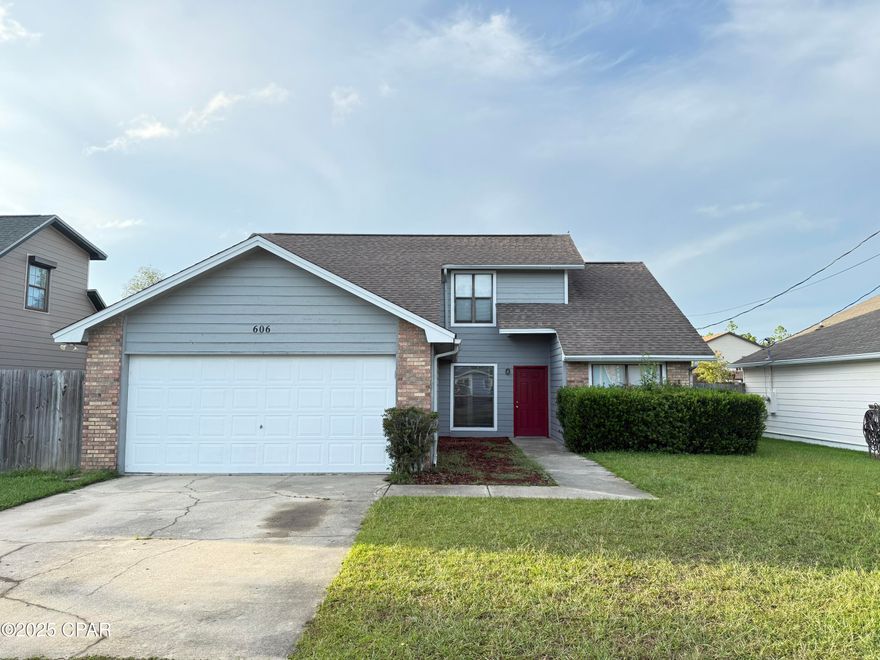 Nice well cared for home located in popular Belaire Estates in Lynn Haven.  Belaire Estates is conveniently located very close to shopping, restaurants, post office, banking and community parks.  Home features vaulted ceiling, open kitchen, formal dining room, brick wood burning fireplace and two car garage.  First floor features two bedrooms and guest bath with Master Bedroom located on second floor.  Exterior of home features sidewalks, open patio, a nice size privacy fenced back yard with room for shop or pool.  Don't miss your opportunity for an affordable home in a great neighborhood in an amazing location.  Call your favorite Realtor today!