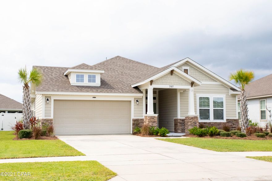 UNDER CONTRACT, TAKING BACKUPS! Absolutely beautiful craftsman style home in the hottest neighborhood in Panama City Beach. Close to dining and local attractions. This home is loaded with UPGRADES! The dining area has a 'bump out' that was custom built with attention to detail. The diagonally laid, large, squares of tile welcome you to this lovely home the moment you enter. There is a separate full bath and guest bedroom at the entrance for extra privacy. The office has beautiful French doors can be used for a 5th bedroom, media room, or man cave. One of the biggest lots available in BP. Full set of metal hurricane shutters. Large attic above garage. Refrigerator and microwave are less than 2 years old. AC Serviced twice a year on maintenance contract. There is a built-in desk near the kitchen area and a huge Breakfast Bar. Brand new Rinnai tankless water heater. Fresh paint through-out. The upgraded gas stove makes this a chef's dream kitchen. Whole Home is wired with speakers for surround sound to play your favorite music! The Master has a special ''boxed in'' trey ceiling that is only is seen in the finest of homes. Wood floors in Master-3 full baths Plenty of natural light makes this beautiful home welcoming to your guest. Playgrounds and green spaces in the community offer a place for the kids to play. The community also features sidewalks throughout for a morning walk or afternoon bike ride. Home also features a mud station for hanging jackets and shoe storage.