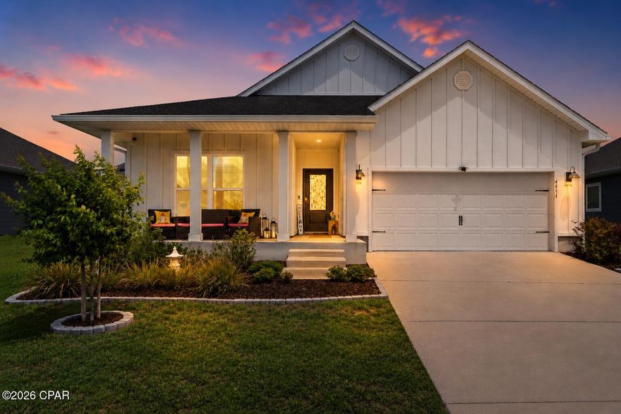 Beautifully designed Delray floor plan located in the desirable Titus Park community! Offering 4 bedrooms, 2 bathrooms, and over 2,000 square feet of thoughtfully designed living space, this 2023-built home combines functionality, comfort, and style in one of the area's most convenient locations.

Enjoy a charming covered front porch, Hardie board siding, and a beautifully landscaped sidewalk-lined community featuring a community pool and convenient access to Publix, North Bay Haven Charter Academy, and the Hwy 231 corridor for an easy commute throughout town.

Inside, the home features a bright open-concept layout with tall ceilings and a spacious living, dining, and kitchen area designed for everyday living and entertaining. The kitchen offers white cabinetry, a large center island, ample countertop space, and abundant storage.

The split bedroom floor plan provides added privacy, with the primary suite tucked away at the back of the home. The spacious primary bathroom includes dual vanities, oversized countertop space, two separate closets, a water closet, and a large 5-foot shower.

Near the front of the home, the flexible fourth bedroom located beside the oversized laundry room can easily function as a home office, flex space, or guest room depending on your needs. The laundry room itself offers additional storage space and functionality.

Step outside to enjoy one of the home's standout features, a large screened and covered back porch overlooking the fully fenced backyard, creating the perfect space to relax and enjoy Florida living year-round.