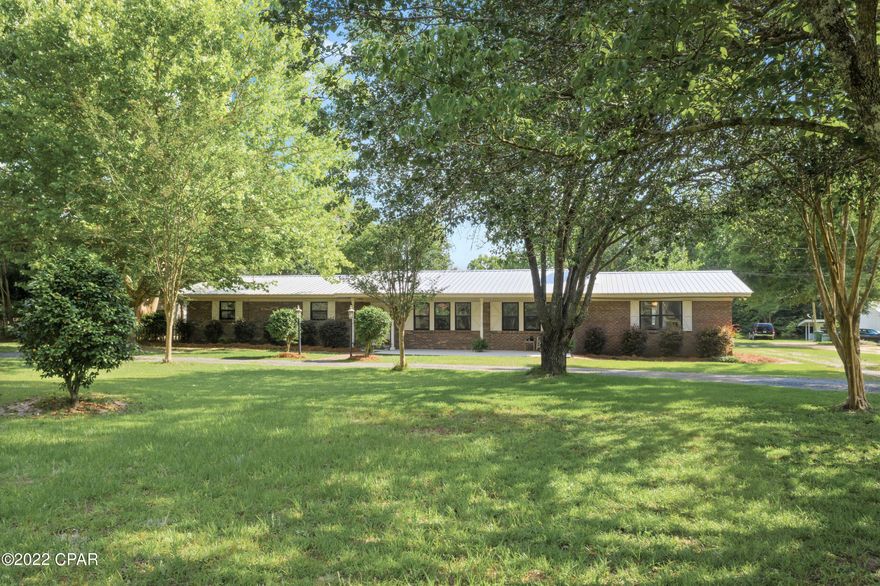 Welcome Home! This 4-bedroom, 3 bath brick beauty has recently undergone a major overhaul and is ready for its new owners. Inside this split floor plan, you will find fresh paint throughout, new HVAC, a spacious dining/living room with wood burning fireplace, kitchen with granite countertops, breakfast bar, stainless-steel appliances and oversized pantry. Other inside features include a 26x15 Florida room overlooking the pool and a massive master suite with tiled shower, double vanity and his/her closets. The exterior boasts a new metal roof, screened in 18x36 saltwater pool, luscious landscaping and circular driveway. Home is conveniently situated on 2 acres minutes from schools, shopping and restaurants.
