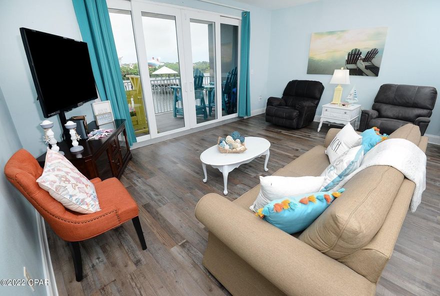 This beautiful and spacious one bedroom unit at Laketown Wharf comes with bunk beds and two bathrooms.  The living area and balcony overlook the lake and fountain which is peaceful.  The main attractions to Laketown Wharf are the resort style amenities, onsite restaurants, a short walk across the street to the beach and convenient walkable shopping/attractions/dining.  The units were built in 2008 making them the most modern on the beach.  The unit can sleep and accommodate 6 people comfortably for seating/dining.  The open floor plan and kitchen island allow for a great space for all to congregate together.  Having two full bathrooms is a plus.  Recent updates to the unit include interior painting and new flooring.  The amenities onsite include convenient beach access, 5 unique pools, Splash Bar & Grill, Gulf view Fitness Center & covered garage parking.  You'll also enjoy the nightly Fountain & Light Show & market shops along the 52,000 square feet Of Lakefront Boardwalk.  Schedule your showing today! The unit does not convey with the bed, patio furniture, picture over the couch, the electronic door lock (it will be replaced with another lock), the Ring doorbell and the personal items in the owner's closet. The unit brought in approximately $36,000 in gross rentals in 2021 through Airbnb.com https://www.airbnb.com/rooms/33935549