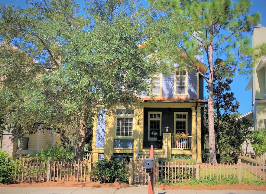 This immaculate home, in the sought after gated community of Wild Heron, is ready to show! This amazing three bedroom, three and a half bath cottage is just steps from the community pool, the boat house and the pavillion! It also comes fully furnished with a few exclusions, has a two car garage and  had a new roof within the last year. Once inside the home, you are greeted by high ceilings, the warm hardwood flooring throughout the main areas, the gorgeous solid wood kitchen cabinets and the stunning decor. The kitchen boasts a Bosch gas stove, dishwasher and microwave and a new Samsung refrigerator. The open kitchen, living and dining areas make for a great comfortable space for everyone to enjoy! Not to mention there is a gas fireplace! The first floor is where the master bedroom, master bath with jetted tub and the laundry room is located. Upstairs are two more bedrooms with ensuite bathrooms and walk-in closets. So there is plenty of room for everyone! You will feel the privacy offered by this home when sitting on the front or back porches since there is no one behind or in front of you and you can enjoy the nature that abounds with the wooded area and the pond that sits just behind the house. If measurements are important, it is the Buyer's responsibility verify. Set up your showing today!