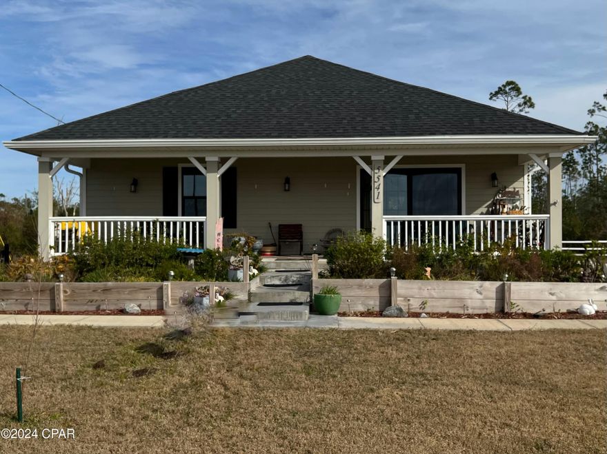 CURRENTLY UNDER CONTRACT, SELLER WILL CONSIDER BACKUP OFFERS Enjoy the beautiful sunsets over East Bay from the front porch of this 3 bedroom/2 bath home just built in 2021. This home is on a peaceful 2 acre lot directly across the highway from East Bay and close to Eastern Shipbuilding. This lot has a 10 foot deeded access to the bay. Bring you kayak, paddle board of jet ski! It's interior has a open living/kitchen/dining area and split bedrooms, with tray ceilings in various rooms. The kitchen has stainless appliances and a beautiful butcher block counter top/breakfast bar. 
The front porch faces the Bay for leisure afternoon viewing and/or sunsets. If you want to grill and hang outside, enjoy the side deck just off the back of the garage. Additionally, there is a 6 bay pole building for storage, hobbies, or whatever one needs. A new deep well was dug in 2020 and includes a Kinetic water treatment system. brand new septic just installed, LP gas runs the tankless water heater and the stove. Tank was filled and has 2-3 years of gas remaining in it. The owner has planted various hardwood trees and flowers on the lot for future enjoyment of the new owner. All of this plus close to boat launches makes this property very desirable. Come see it today.
(The parcel sold in January was behind this 2 acre lot. It has been split from this property and is not part of this sale)