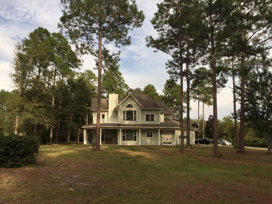 Come spread out in this large family home situated on two acres. This home features wrap around covered porches, spacious decks, tall ceilings throughout, lots of windows, upgraded kitchen and oversized two car garage! This home has an amazing floor plan with master suite down, three bedrooms upstairs and a 

bonus area. There are nice custom features such as vaulted ceiling in the living room and master bedroom and a great wood burning fireplace in the living room. There is also some terrific bonus space in the well-insulated attic with 8 ft ceilings. This home offers a lot more space and land than your typical new construction.