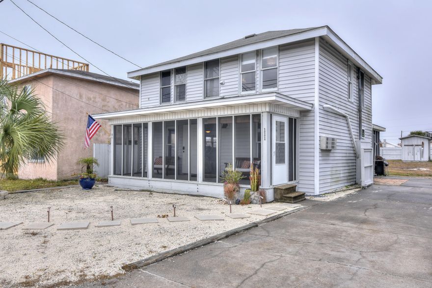 Great beach house very close to the beautiful dedicated Laguna Beach access, right across from Carousel Supermarket.  Nice views from the cozy screened in front porch.  Large lot with room to expand with a carriage house and/or pool.  Newer HVAC and Rinnai water heater.  This home has undergone several upgrades, but still maintains the charm of a 1940's beach cottage.  Please contact us for rental numbers in place.  Don't let this one pass you by!  All dimensions to be verified by buyer.