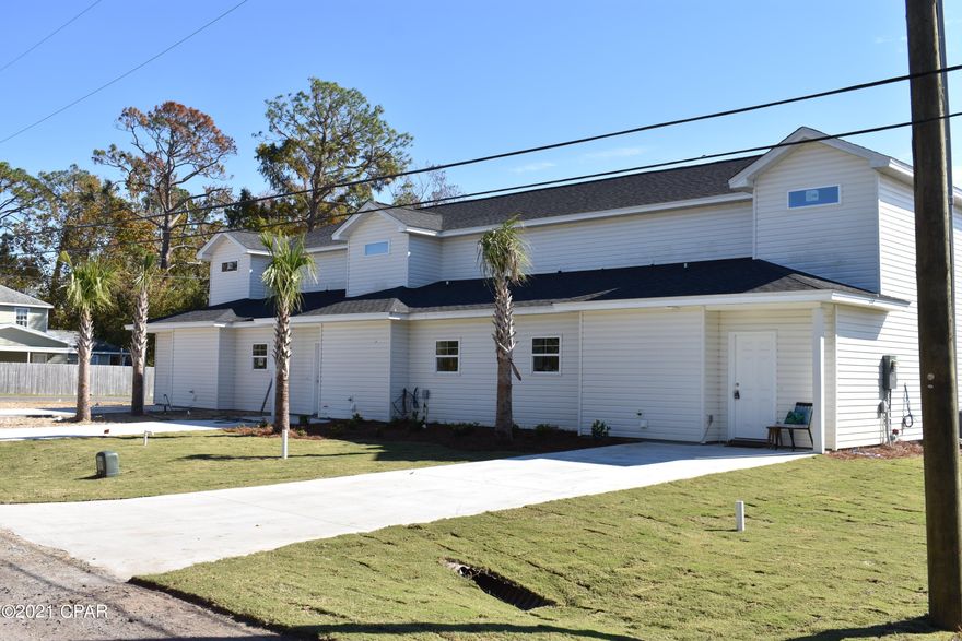 New construction on Panama City Beach,  over 1,600 square feet, 3 bedrooms, 2.5 bathrooms. Master suit on the first floor along with a half bathroom. This townhome features open floor plan, Tile flooring, Quartz counter tops, custom cabinets, and all energy efficient hot water heater and HVAC system. This wonderful home is located centrally on Panama City Beach, just minutes to the Gulf of Mexico and Pier Park as well as the Navy Base and schools! Where else on Panama City Beach can you find brand new home under 300K.  Two other units available as well, you can purchase all three and own the entire building! Call today for additional details.