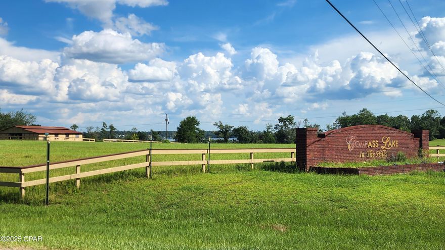 Are you looking for that perfect lot to build your new home?  Welcome to Lot 11 on Grand Quiviera Circle in Compass Lake in the Hills.  This lot is located in the upper corner of unit 5 on the outer edge so no neighbors behind you.  Electric has just been run down in front of this property making that available.  Lot will require septic and well.  Compass Lake has a voluntary POA of 135 annually that allows the use of all the amenities, if desired. This lot is right around the corner from its smaller sister McCormick Lake.  If you are not familiar with the Compass Lake in the Hills area, it is truly a must see to appreciate the beauty and quiet the area offers!!