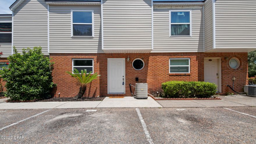 Are you looking for condo living off the beaten path away from the hustle and bustle of PCB?  Look no further than The Landings at Lake Caroline!  This 2BR/2.5BA unit coming in at less than 200k is now ready for you! Yes, you read that right- LESS THAN 200k! This home has been chicly renovated with all new exterior doors, sliding glass doors, all new windows, all new kitchen with new cabinets,  stainless steel appliances, and quartz countertops, LVP flooring throughout, new carpeting on the stairs, and fresh paint throughout. Bottom floor bath has wainscoting style accented walls added, and upstairs bathrooms have new quartz countertops, along with a new his and hers vanity, mirror and lighting in the master. New light fixtures and ceiling fans as well. Simple elegance, done well. There is a balcony off the master to enjoy, as well as a sizeable porch/patio/entertaining area overlooking the pool! The outdoor area has been stylized with pavestones and freshly laid sod, and the neighboring louvered fence panels really top off the aesthetic nicely.  This area is perfect for those summertime get togethers coming up! Honestly, the only thing missing from this beautiful home is YOU! It is 100% turnkey- ready to move into and enjoy right away. Schedule an appointment to see with your favorite Realtor today!  All info contained within this listing is presumed to be correct- if important, all info must be verified by the buyer.