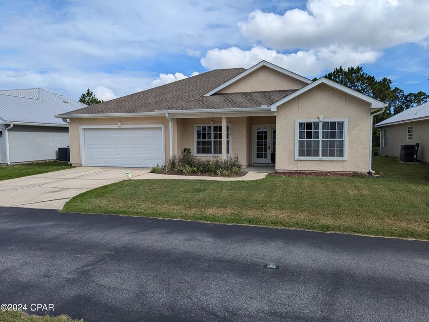 PCB Rental, Pool, 3/2! 6709 Harbour Blvd, Panama City Beach, gated subdivision with pools, tennis and club house...3 minutes from the Bridge and 10 minutes from the beach it truly is ideal! House features 3 beds, 2 full baths, brand new LVP flooring, kitchen, dining, family room all open together. Master suite and 2 guest bedrooms are a split floorplan. Back porch is covered for grilling, entertaining or just relax and watch the water. Fish in your backyard! Steps to the pool, minutes to the beach, Navy Base, Pier Park and Panama City Proper. Even has a two car garage. Included - lawn maintenance, cable and trash. Background check a must, no pets, tenant pays power bill. Come visit today!