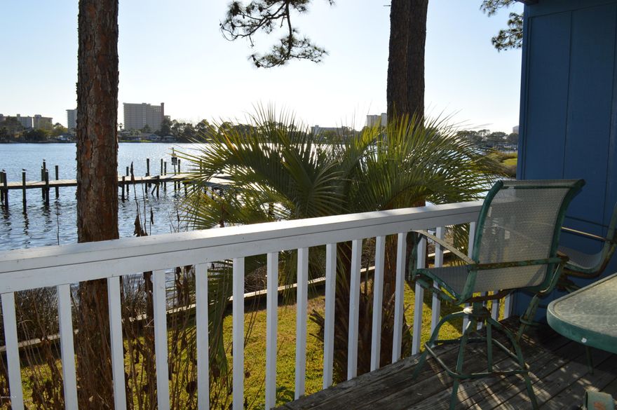 Beautiful views from your balcony on the water from this awesome, fully furnished condo!  First floor with plenty of parking and a short walk to the pool for a quick dip.  Enjoy included multiple boat slips with your HOA fee with fresh water.  Contact agent for further details about this unique situation.  You have to see this to believe how close to the waters edge you truly are.  Expect many beautiful sunsets from the comfort of your own home on the waterfront.  The days on the market will surely be numbered with this gem!