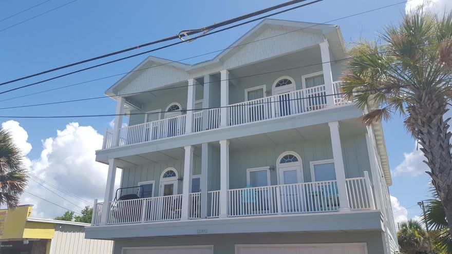 Just like being gulf front! This 3 bedroom, 2 bath is like being right on the water. What a fantastic view that is offered from the balcony. Features include granite counter tops, high ceilings, spacious rooms, extra large garage and easy access to the beach. Yes, this 3 bedroom, 2 bath, 1800 square feet condo is perfect for a second home or permanent residence. The elevator offers convenient access to your unit so no walking up the stairs. Garage is large enough for a pontoon boat. Small complex means only you and three other neighbors.  GREAT NEWS per the Seller Short term rentals will be allowed possibly as soon as the last of July, PROPERTY will allow weekly rentals.