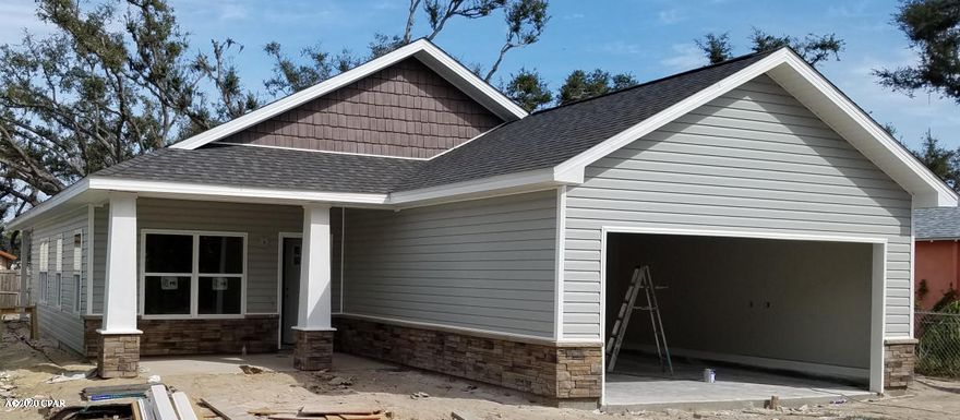 Rare new construction in the heart of St.Andrews! Built by local builder. Walking distance to St. Andrews restaurants, shops, and park, see the water from your front yard, large lot. No flood insurance required. High ceilings, upgraded insulation, upgraded energy efficient windows and doors, upgraded light fixtures, upgraded plumbing fixtures, solid surface counter tops in kitchen and baths, white shaker style cabinets with soft close doors and drawers and pull out trash can cabinet, all stainless steel appliances, crown molding in living area, luxury vinyl plank flooring in living areas, soaking tub in master bathroom, two walk in closets in master bedroom. House will be completed by 1st week in April.