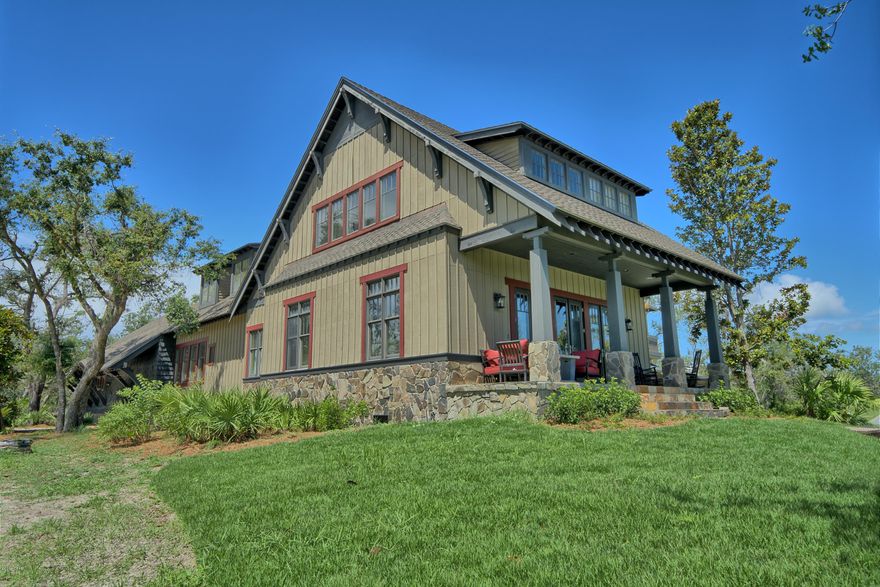 CURRENTLY UNDER CONTRACT, SELLER ACCEPTING BACKUP OFFERS! This spacious 4 bedroom, 4.5 bathroom home features a large front porch, pine flooring through out the first floor, Viking appliances and a stone fireplace in the family room.  All bedrooms have a en-suite bathroom and there is a large bonus room perfect for kids of all ages. The first floor master bedroom has a double vanity, walk in closet and separate shower and soaking tub. Sanctuary Beach is a gated community offering residents a community pool and low HOA dues. It is located in close proximity to the golf course at Bay Point and the world's most beautiful beaches.