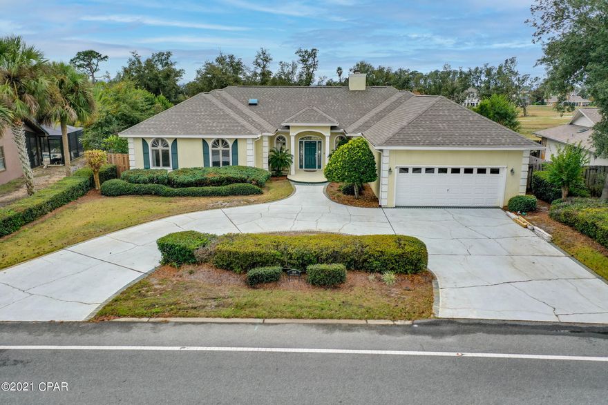 'CURRENTLY UNDER CONTRACT, SELLER ACCEPTING BACKUP OFFERS'  >>>Southern living at its best!  A gracious, open, bright & airy home w/ 12ft ceilings, huge Palladian windows looking to back patio & gardens.  Beautiful marble tile in foyer.  Wood-burning fireplace w/ floor to ceiling tile.  Separate family room w/ built-ins.  Large eat-in kitchen w/ tons of cabinets & storage.  Separate formal dining room w/ more Palladian windows.  Master overlooks patio & gardens.  His & her master baths!!  Two nice guest rooms on the front of home w/ a gorgeous guest bath showcasing a huge garden jetted tub overlooking a private garden, separate shower, pedestal sink, floor to ceiling mirrors.  Laundry/Mud rm off 2-car garage w/ more storage.  Brand new roof Dec 2021.  Entire interior just painted. All of this plus the resort of Bay Point, a gated Golf & Yachting Community with the world class Jack Nicklaus golf course, brand new marina currently under construction, on-site hotel and retail, and Post Office.  Come be a part of this fabulous community and resort.  You'll love it here.