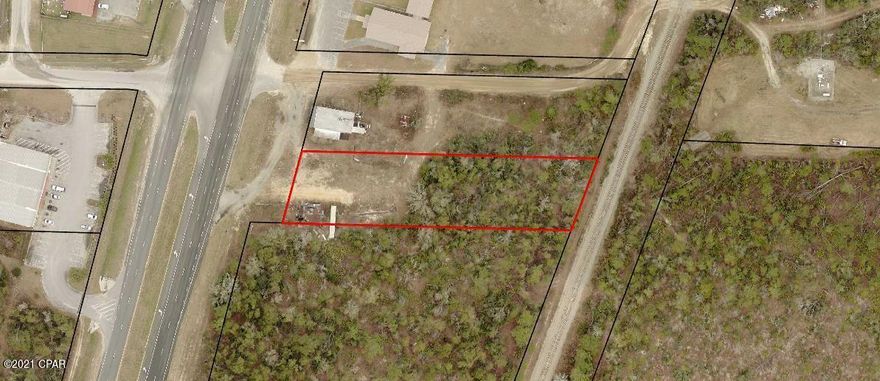 This lot has been partially cleared and has road frontage on Hwy 231 North. It has a median cut for access in the highway and is adjacent to a building that was formerly a restaurant. It is across the street from Piggly Wiggly.