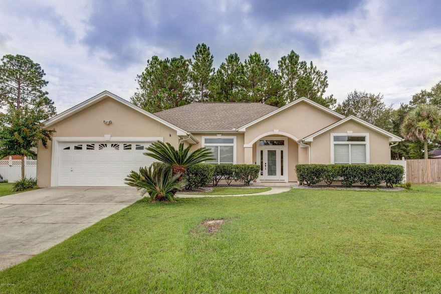 Back on the market due to buyer not getting orders. 3 bed/2 Bath home with a salt Chlorinated Pool! Roof replaced in 5/2014,A/C is newer also,both under warranty and transferable. Updated throughout with new light fixtures, door handles,bamboo flooring and granite countertops in kitchen.Stainless appliances convey including refrigerator.When you walk into this home the large foyer opens to a formal dining room on one side and an office or den on the other side.Then you'll see the large greatroom that has a fireplace all open to the kitchen with a separate eating space, great for entertaining.2 bedrooms on one side of the home with the Master on the opposite side w/its own ensuite. When you walk outside you will enjoy sitting in the fully screened and covered patio or by deck.