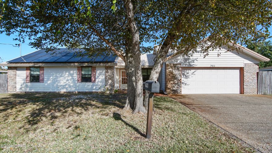 Well-maintained 3 bedroom, 2 bathroom single-family home in the heart of Panama City, Florida. This move-in ready property offers a spacious layout with an oversized living area featuring a fireplace, a two-car garage, and a large fenced backyard with a storage shed. The home comes equipped with paid-off solar panels for reduced energy costs and custom hurricane shutters for added storm protection -- two high-demand features that provide long-term value and peace of mind. Major updates include a roof replaced in 2019 and a water heater approximately 3 to 4 years old. Conveniently located close to shopping, restaurants, and everyday amenities, with easy access to the beach approximately 15 minutes away. A solid, well-kept home with meaningful upgrades already in place -- ready for its next owner.