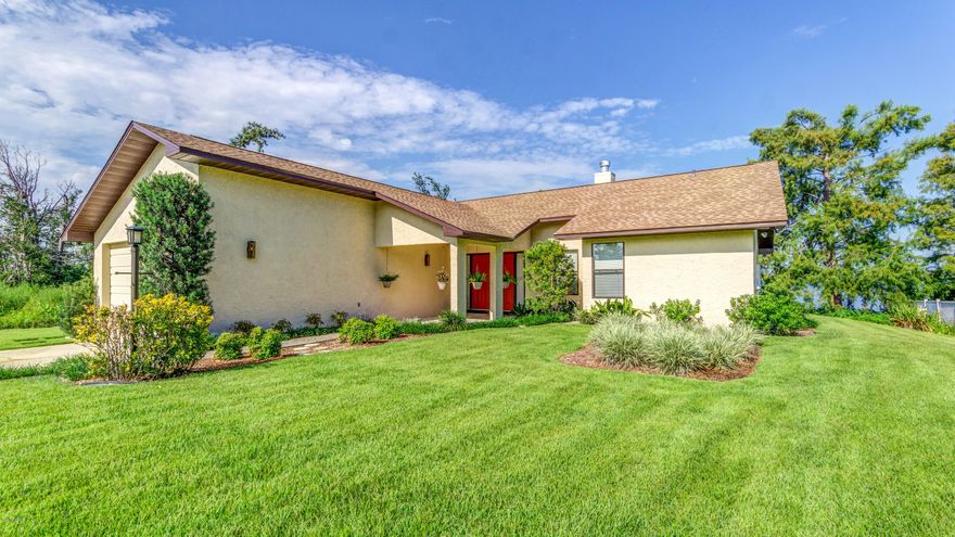 Welcome to the lake – a place of boating, swimming and beautiful sunsets!! This beautifully maintained three bedroom home with approx. 75 feet on Deerpoint Lake is now available. As you enter the home into the spacious Great Room, you can see all the way to the water through the spacious sun porch. The Great Room has vaulted ceilings and a wood burning fireplace with a blower. Surrounded by windows, the sun porch is a great place for reading, painting or evening dinners. All appliances remain in the kitchen which also has a breakfast bar as well as a dining area that looks out to the water. The floor plan is split bedroom and the master bath has been remodeled  featuring double raised vanities and a large, tiled walk-in shower. There is new flooring throughout the home and it has been freshly painted as well.

Outside the home, the lot has been recently re-sodded and the back deck with a pergola offers unobstructed views of the lake. You can also catch the sunset on the waterfront deck. There is a sprinkler system on a timer for the landscaping and a two-car garage. The home is on well so water bills are low, the home has a new roof and the exterior has been recently repainted. 

Call your Realtor today to tour this wonderful home.