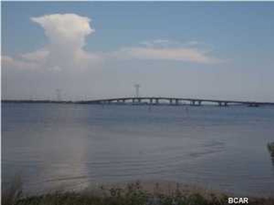 The gated and deed restricted community of Dolphin Bay awaits you! This is a prime location for a fabulous waterfront home with 105' frontage right on the Bay. The seawall is already in place. To protect your investment, this community is deed restricted and with low HOA dues! Make an appointment to see it for yourself, before its too late!