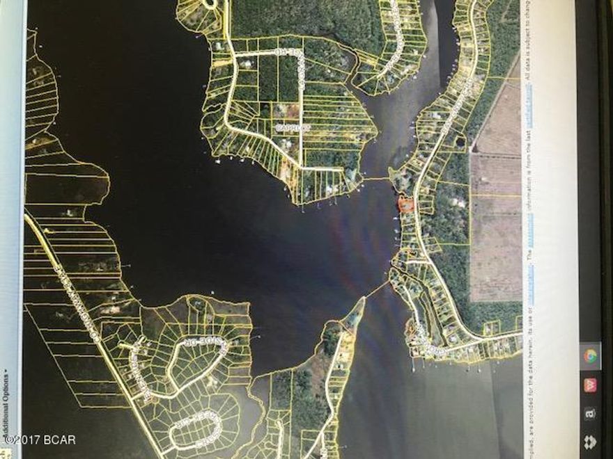 Nice cleared Bay front residential lot. 128' on the road. Lot sits directly on the open Bay. Build your dream home and enjoy the wonderful sunsets over the Bay.