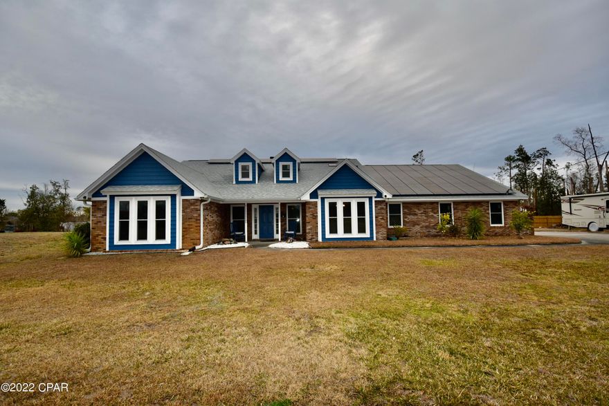 Incredible POOL home on .74 acres IN-TOWN and NO HOA! Loaded with value; live virtually utility free with a 36 panel, 10 kilowatt solar system, deep-water well, and septic! Seller will offer up to a $5,000 buyer credit, with a full price offer!  This executive style home boasts 2,622 sq ft with 4 bedroom, 3 bath, large 40 x 20 in-ground pool and outdoor entertainment/bar area. Have peace of mind by parking your boat, jet ski's, RV or trailer's ... there is plenty of space to include a 30 amp hookup for your RV! This custom home was designed with space, functionality, and storage in mind. As you enter the home through the foyer, you can't help to notice the vaulted ceiling, skylights, and the double-sided wood burning fireplace looking from the great room to the family room. This home boasts more than enough room for your family with an exceptional amount of detail, storage, and privacy. The kitchen is sure to be any home chef's favorite with premium appliances and ample storage. Appliances include Whirlpool refrigerator and stove (2021), and Bosch Dishwasher (2017). The kitchen offers an abundance of storage and cabinet space, featuring an island, breakfast bar and a sliding door to the outdoor entainment areas. Finally, the spacious kitchen offers easy access to the dining room. This home offers extra privacy with a split-floor plan between the main bedroom and other three bedrooms. The main bedroom offers a large walk-in closet, private entry to the pool area, and a custom barndoor leading to the master bath.  The master bath offers a double vanity, step in shower w/seat, and a freestanding soaking tub. The second main bedroom offers privacy with an en suite bathroom with step-in shower and private door to the pool area. The laundry room comes complete with a washer and dryer, hanging/bottom cabinet space, as well as a utility sink. 

Plenty of hot water is serviced through two hot water tanks; a 40g and 50g installed Feb 2021.  HVAC runs efficient by TWO air conditioners; both are 2.5 tons installed in 2014 and 2021.  Solar panels will be PAID OFF prior to closing; a $50,000 value!  Septic was inspected and pumped Nov 2020. Saltwater pool uses a variable speed pump and includes a poolside storage shed.  The well and home water system flows through a Culligan Water Softener/Treatment system.  The double sided fireplace was cleaned  in 2019; heat your great room and family room, and kitchen area simultaneously. 


Outdoor entertainment is at its best; relax and unwind by the pool or bar area, and enjoy the tranquility, safety, and security within your fenced in backyard.  Extra privacy is ensured by the back fence being 8' high. This is the perfect space for your kids, pets, or just a fun relaxing day in the sun. The oversized garage and workshop offers plenty of options with the additional space.  Seller's are moving down south, and downsizing.  The purchase of this home includes storage cabinets in the garage, solid wood workbenches with accessories, a 21' Troy-bilt lawn mower, a Craftsman RER1000 riding mower, and other associated yard equipment.  Hurricane ready! Home includes a 7550 watt Generac generator; plywood and wood bracing to cover windows in the event of a storm.  This home is emergency prepared in many aspects! Everything in garage stays to ensure the future homeowner has the tools and supplies to be ready! (paint, pool chemicals/supplies, ladders, extra building materials, etc) This home has it all! Call for your private tour today ... it won't disappoint! Measurements approx; verify if important.
