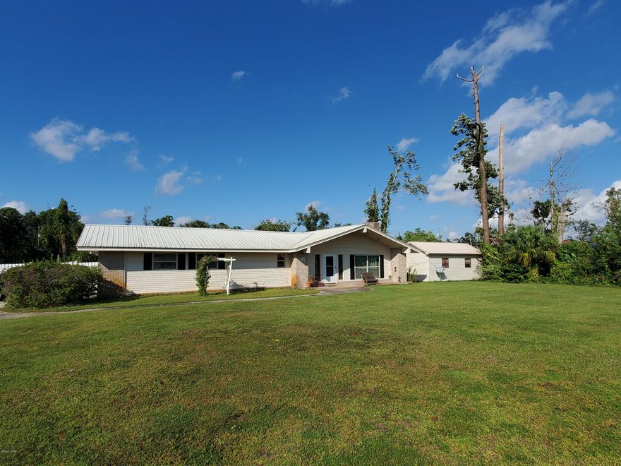 'CURRENTLY UNDER CONTRACT, SELLER ACCEPTING BACKUP OFFERS'

Beautiful ranch style home in the heart of St. Andrews covering 3 and 1/2 lots. This renovated home has plenty of room for toys with an attached two car garage, a separate 2 car detached garage with workshop, and another yard building for lawn equipment.  There is a greenhouse in the backyard next to the newly lined in-ground pool with new pump system. Step inside to a large living and dining room with hardwood floors and a vaulted ceiling with exposed beams. The updated kitchen is complete with stainless steel appliances, gas stove, butcher block counters and plenty of cabinet storage. The large master suite opens to the enclosed Florida room and pool area. The master bath has an exquisite claw tub with shower diverter and antique double vanity cabinet/sinks. Call for a private showing.