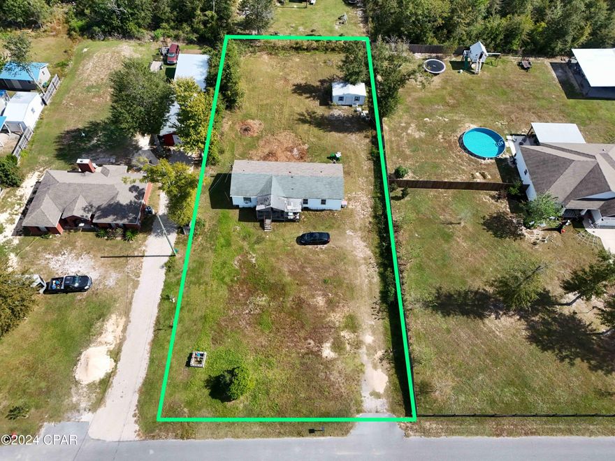 Unlock the potential of this 4-bedroom, 2-bathroom mobile home on a generous 0.64-acre lot, offering ample room to transform and add value. With 1,344 square feet of living space, this property has an after-repair value well over $150k, making it an incredible investment opportunity. Currently rented month-to-month with a tenant interested in staying, it provides immediate rental income. The front porch is unattached and easily removable, allowing flexibility for exterior updates. Located in flood zone X and zoned R-2, the home also features a well and septic system for added savings. A cash-only opportunity, this property is ideal for those ready to bring it to its full potential!