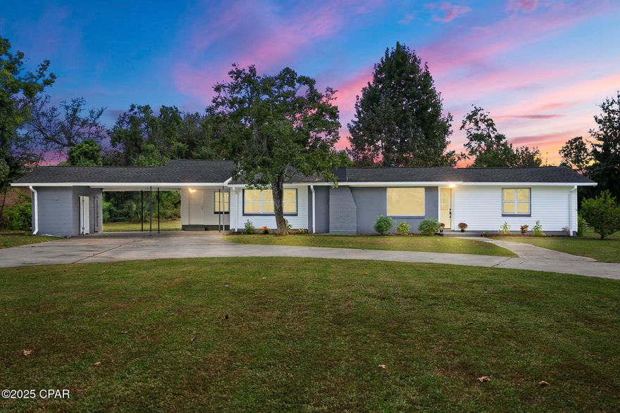 NEARLY 1 ACRE, WITH NO HOA! Beautifully renovated in a neighborhood near Tyndall Air Force Base. Offering the perfect combination of modern upgrades, spacious living, and expansive outdoor space, this move-in-ready property is a rare find.

Inside, you'll discover a bright open-concept floor plan with luxury flooring throughout, abundant natural light, and stylish finishes designed for both comfort and entertaining. The fully updated kitchen features granite countertops, custom cabinetry, and seamless flow into the living and dining areas, creating an inviting space for gatherings and everyday living.

Both bathrooms have been tastefully remodeled with contemporary fixtures and finishes, while the home's thoughtful renovations provide a fresh, modern feel throughout. A new roof installed in 2019 adds additional peace of mind.

One of the standout features of this property is the expansive 0.96-acre lot, offering endless possibilities for outdoor living, recreation, gardening, RV or boat parking, or future additions such as a pool, workshop, or detached garage. The circular driveway provides excellent curb appeal along with ample parking for guests and multiple vehicles.