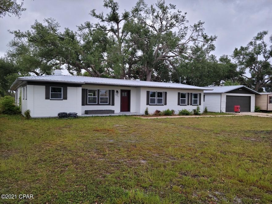This home has had a completes remodel from the new metal roof down. All new windows, new cabinets and granite counters in kitchen and bathrooms. New LVP floors throughout. The home shows beautifully, and after all that the property has excellent westerly views to the Bay. The large lot has Large Oak trees creating plenty of shade. Solid concrete block and separate garage. The property sells itself.