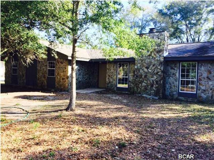 This is a 3 bedroom 2 bath home totally renovated with nice size bedrooms. Large Great Room and Kitchen combination, kitchen has been remodeled with new cabinets and counter tops as well as stainless appliance package. Great room has vaulted beam ceiling with wood burning fireplace. Laminate wood flooring in the family room & great room, tiled hall and baths and the bedrooms have new carpet. Freshly painted exterior and interior. New A/C unit as well as hot water heater. Bathrooms have been remodeled with new vanities and fixtures. This home would be great for a growing family. Great price for this sq'.