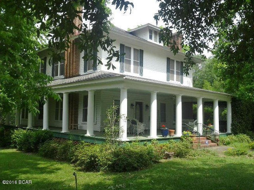 Want a home with lots of historical charm? This beautiful well maintained 1910 home can be yours! It has 5 bedrooms and 3 baths, 6 fireplaces and huge rooms. The ceilings are approx. 12 feet high. It also features a large detached 2 car garage (25x20) but for your convenience there is an attached carport to the side of the front porch. The seller is very motivated and is open to all offers. Make an appointment to see this beautiful southern home today!