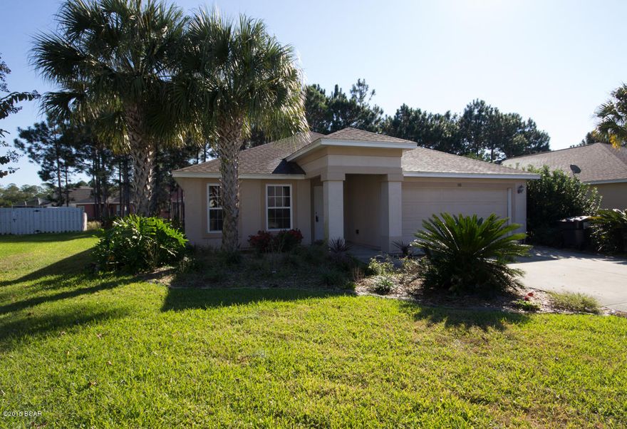 home has just been painted on the inside...has a split bedroom plan...master bath has separate shower and tub...walking distance to pool and club house...home is very very close to pier park.....very large den that opens into the kitchen...separate dinning room...screened back porch...double car garage