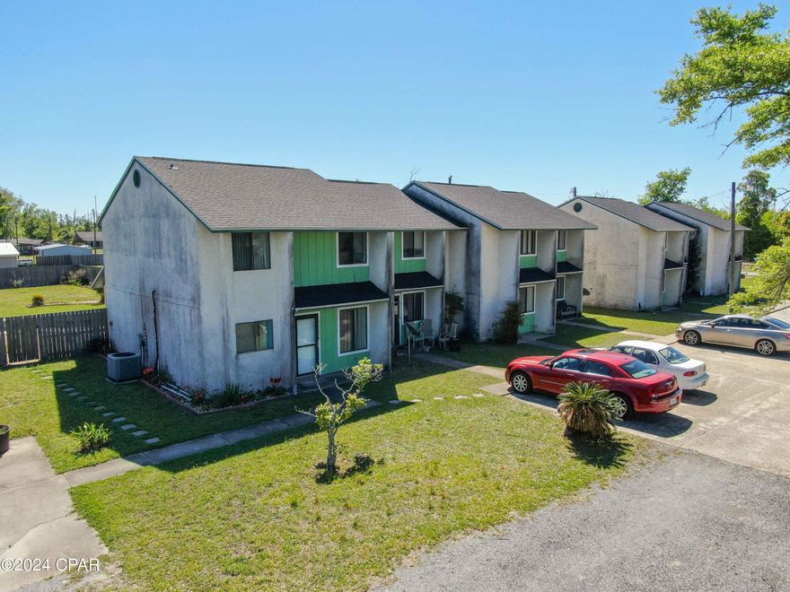 Rare opportunity to purchase a turn key quadplex! Unit A (vacant and move in ready) features 3 bedrooms, 2.5 bathrooms, approx 1,400sqft heated and cooled and large fenced in back yard with a pool. The other 3 units are occupied with long term tenants. All units are separately metered for water and electric with tenants paying their own utilities. The property also features additional land with potential to build on.  
Centrally located with easy access to Tyndall Air Force Base. Do not miss out on this incredible opportunity to live in one unit and rent the others or add all 4 to your portfolio!