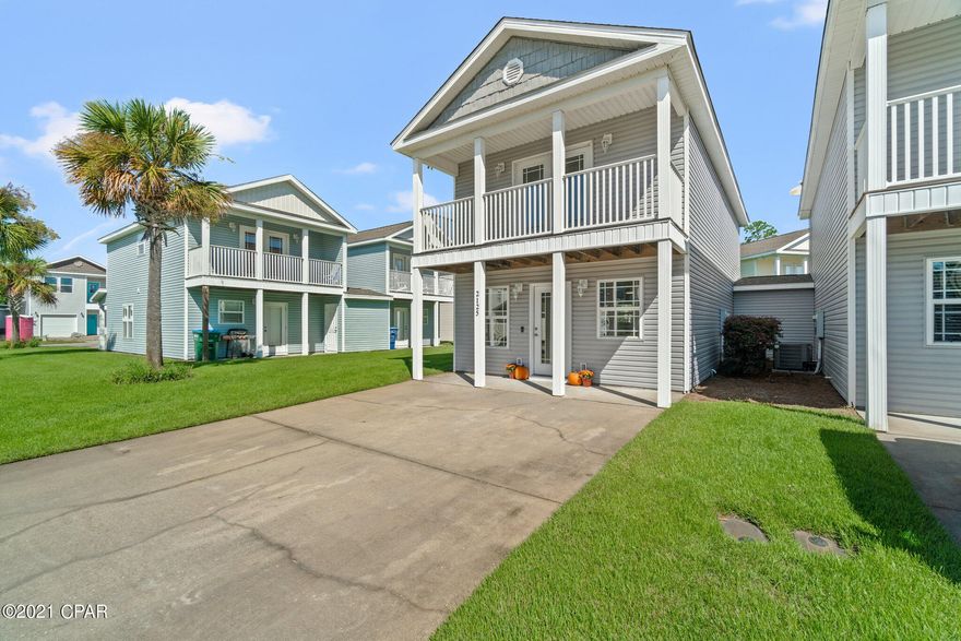 **Currently under contract, seller accepting back up offers**Adorable and Affordable!  Gated community with pool and low HOA, 2 bedroom 1.5 bath.  Each bedroom has it's own private balcony.  This home is a few short miles to the beach & marinas and is within walking distance to dining, shopping, entertainment & gym.  Updates include new ceiling fans, new bathroom vanity, fresh paint downstairs, & stainless steel appliances.  Call today to claim your slice of Paradise at the world's most beautiful beach!