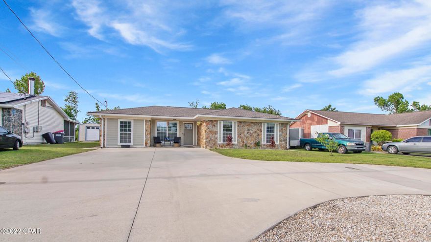 BRAND NEW ROOF! up-to 50 year warranty! Beautiful 4 Bedroom 2.5 bathroom home located close to Tyndall air force base and shopping centers. Open floor plan from the living area and kitchen. Stainless Steel appliance with newer cabinets and backsplash. There is a large fenced back yard with side entrance gate that will accommodate a car and trailer. The back yard has a separated garden and pet area. Covered back patio. Large wrap around circle driveway for ample parking and ease of use. The home is equipped with a generator hookup that can power the entire home. On City water and sewer but has a private well to save money on irrigation!