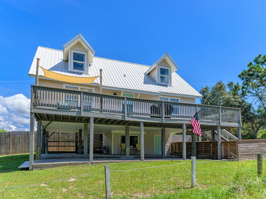 BACK ON THE MARKET! Tour from home...click on the attached virtual tour. This updated 3/2 beach home on a quiet dead end street, is within .5 mi. to the beach, and would make a wonderful primary or second home.  

  Huge covered patio areas for outdoor living are 38 X 19 and 18 X 13. Ground floor attached 20 X 13 storage area.  

   High and dry on pilings with over 400 sq. ft. of wraparound deck on the second floor.   Updated kitchen with stainless appliances and pantry. Spacious great room. Main bedroom and bath with shower on the first finished level. Two additional split plan bedrooms and a full bath upstairs. 

   Updated flooring and paint throughout. New metal roof, septic system, and HVAC in 2017.  All appliances replaced in 2016.  Termite bond, seller has certified copy of survey. Furnishings are negotiable. Perfectly located eight minutes to 30-A or Pier Park, and convenient to shopping, dining, recreation, and State Parks.  County zoning allows for short term rentals.

INFORMATION CONTAINED HEREIN IS DEEMED RELIABLE, BUT NOT GUARANTEED. SHOULD BE VERIFIED BY BUYER. SUBJECT TO ERRORS, OMISSIONS, PRIOR SALE, CHANGES OR WITHDRAWALS WITHOUT NOTICE