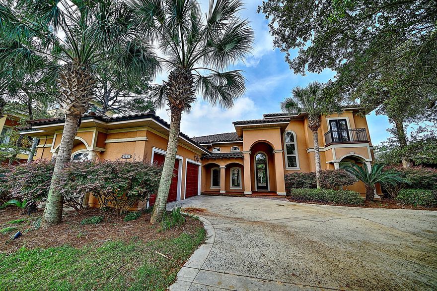 6 deer were near the house this evening after open house!!! Elegant Finisterre family home with pool and tropical yard with unmatched privacy in Panama City Beach's loveliest gated waterfront community! Soaring 14 ft ceilings, spacious rooms, every bedroom en-suite! The master opens to the fabulous pool deck and outdoor space that beautifully integrates indoor and outdoor living. Half bath exits to pool. This home is surrounded by superb mature trees & foliage that add to its fabulous ambiance and privacy. Each beautiful bedroom boasts a full bath and balcony or patio. Tons of storage, great laundry room and pantry. See this elegant yet comfortable family home. Finisterre, Bay County's premier waterfront neighborhood, boasts community playground, tennis court, basketball court and dock. This wonderful home is gorgeous! Over 1100 sf of fabulous extended and covered, extremely private outdoor living space makes this home unique in this exclusive gated neighborhood! Outdoor shower and pool bath make this elegant home family friendly. New carpeting and both HVACs new in 2014.