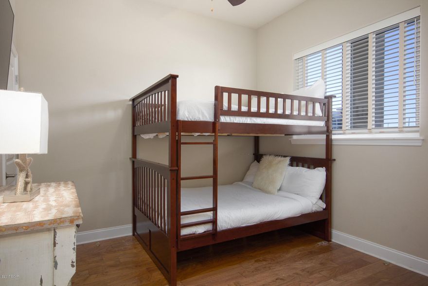 Fully furnished and rental ready -- including 4 flat screen T Stroll across the street to the beach via one of two beach accesses, or hop in your golf cart for a short ride to shopping, dining and entertainment on Scenic 98 (a.k.a. Old 98).This 2nd-floor, 3-bedroom condo offers wood floors throughout with tile in baths; 10-foot ceilings; crown moulding in living area; granite countertops in kitchen & baths; stainless steel appliances; washer and dryer. Alerio is fenced and gated, with heated pool, hot tub, splash pad for kids and outdoor grilling area. Don't miss this unique opportunity to own a turnkey vacation rental condo!