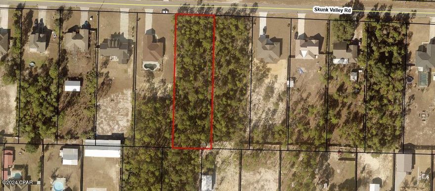 Vacant residential lot approximately 102 x 328 or .76+- acres.  Property is located in rural White Oaks Subdivision.  Leave the city life behind, but live in a beautiful residential area. Envision your dream home on this large residential lot.  Located just a few mils from Lynn Haven, but close to restaurants, shopping, schools as well as several springs and lakes.  Beautiful and quiet location.  The PCB airport is just a short 15 minute dive away, making travel a breeze.  For those in the military, the Naval Support Activity and Coast Guard Station is within a 30 minute drive.  For those working with Air Force, Tyndall Air Force Base is within a 35 minute drive.