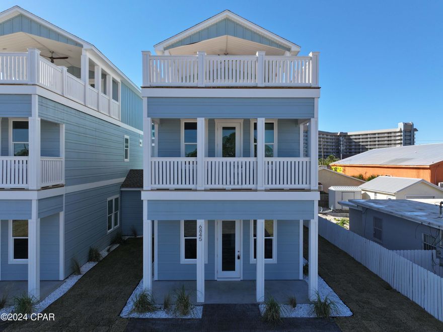 CURRENTLY UNDER CONTRACT, SELLER WILL CONSIDER BACKUP OFFERS

BEAUTIFUL NEW CONSTRUCTION! This one is now complete and ready to be your next beach home or rental investment. This brand new home is a part of six that are being simultaneously built just 2 blocks from the emerald green waters of the Gulf of Mexico, and the snow-white sands of beautiful Panama City Beach.  Short term rentals are allowed for these potential rental giants! There are NO Current HOA fees! - This home features a unique kitchen pantry, quartz countertops, and modern cabinets with soft close doors and drawers. Three stories and 4 bedrooms, all of which have their own bathroom. Two have their own private balconies. The main 2nd floor master features a spacious spa-like, tile walk-in shower with dual showerheads, one at each end, that can be used simultaneously or one at a time. The huge 3rd floor balcony could be used as an amazing entertaining space. The large, stamped and colored cobblestone driveway will easily accommodate 4 or more vehicles, again, making it ideal for entertaining. They plush Zoysia grass wraps around this beautiful home and is maintained by the timer on the irrigation system. Just set it and forget it! This golf cart friendly area allows you to be at the beach in a matter of moments. Are you ready for everything new? This home is for you!