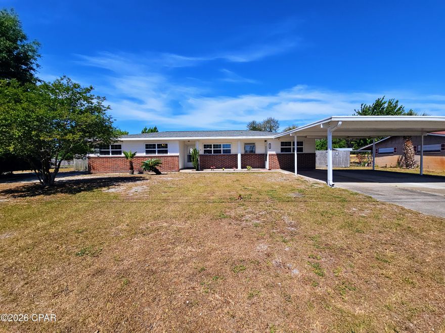 Welcome home to comfort, space, and convenience in the heart of Panama City! This versatile 3-bedroom, 2-bath home sits on a generous .34-acre lot, offering plenty of room to spread out both inside and out.

Step inside to an open-concept living area featuring a spacious kitchen with stainless steel appliances, perfect for entertaining or everyday living. In addition to the main living space, you'll find two large bonus rooms at 18'x12' and 17'x12'--ideal for extra bedrooms, a home office, gym, or additional gathering areas to fit your lifestyle.

The primary suite offers privacy and comfort with an attached bath featuring a tiled walk-in shower.

Major updates provide peace of mind, including a 2018 roof, 2018 central heat & air system, and a 2018 tankless water heater--giving you efficiency and reliability for years to come.

Out back, enjoy a fully fenced yard with 6' wooden privacy fencing and double gates, perfect for storing boats, trailers, or creating your own backyard retreat. The outdoor space is loaded with extras including:

Covered patio for relaxing or entertaining, a 10'x18' storage building with an additional 9'x20' covered storage area plus a 8'x10' poly shed

Location is a standout feature here--just minutes from Tyndall Air Force Base, making it a fantastic option for military families or anyone wanting an easy commute.

Plus, you're a short drive from the white sandy beaches of Panama City Beach, where you can enjoy world-class fishing, boating, dining, and the laid-back coastal lifestyle that makes this area so desirable.

If you're looking for space, flexibility, and a location that blends everyday convenience with coastal living--this one checks all the boxes.