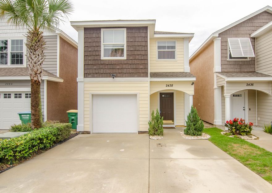 *NEW ROOF *NEWLY PAINTED. This low maintenance 3BR/2.5BA home is located inside a gated community less than 2 miles from the sandy beaches. When you enter the home you will be greeted with a foyer with stairs to the right and a wide hallway to the left that leads to the kitchen/living area. As you head down the hall you will notice tall ceilings and beautiful crown molding. The kitchen is open to the livingroom and features a breakfast bar, Maytag stainless steel appliances, real wood cabinets and a ton of counter space for food prep.  Upstairs you will find the washer and dryer, master bedroom/bath, a full spare bathroom and two spare bedrooms. The master bedroom is located at the back of the home and features a walk in closet and master bath. The other two bedrooms are located close... by, one features a sitting nook and the other room has a desk and is currently being used as an office. The desk can be removed prior to closing for a 3rd bedroom.  As you head outside you will notice a vinyl privacy fence with LED lighting, a new back deck made of Trecks and a covered patio. The home is also equipped with a ring doorbell and smart security camera floodlight. The garage has an epoxy painted floor. Washer and dryer convey. 

All sizes and ages are approximate, please measure and/or verify if important.