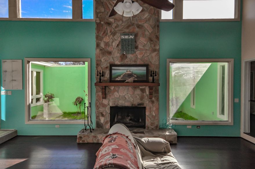 You do not want to miss a viewing and your chance to purchase here.  This a very beautiful and unique home on a huge corner lot with brand new siding and brand new roof in Dec 2014. It offers 2483 sq ft with 3 bedrooms and 2 bath.The living room is sunk in unlike most you will find.  There is a 17 x 30 den/workshop/playroom that is totally enclosed so you will not hear the noise in the rest of the house.  You have a really huge deck on the back of the house. It feels like you're in the country but you are minutes to the mall, restaurants, shopping,and the new international Airport.   If you work at Tyndall or want to go to the beach, either way, it is only a 20 minute drive.